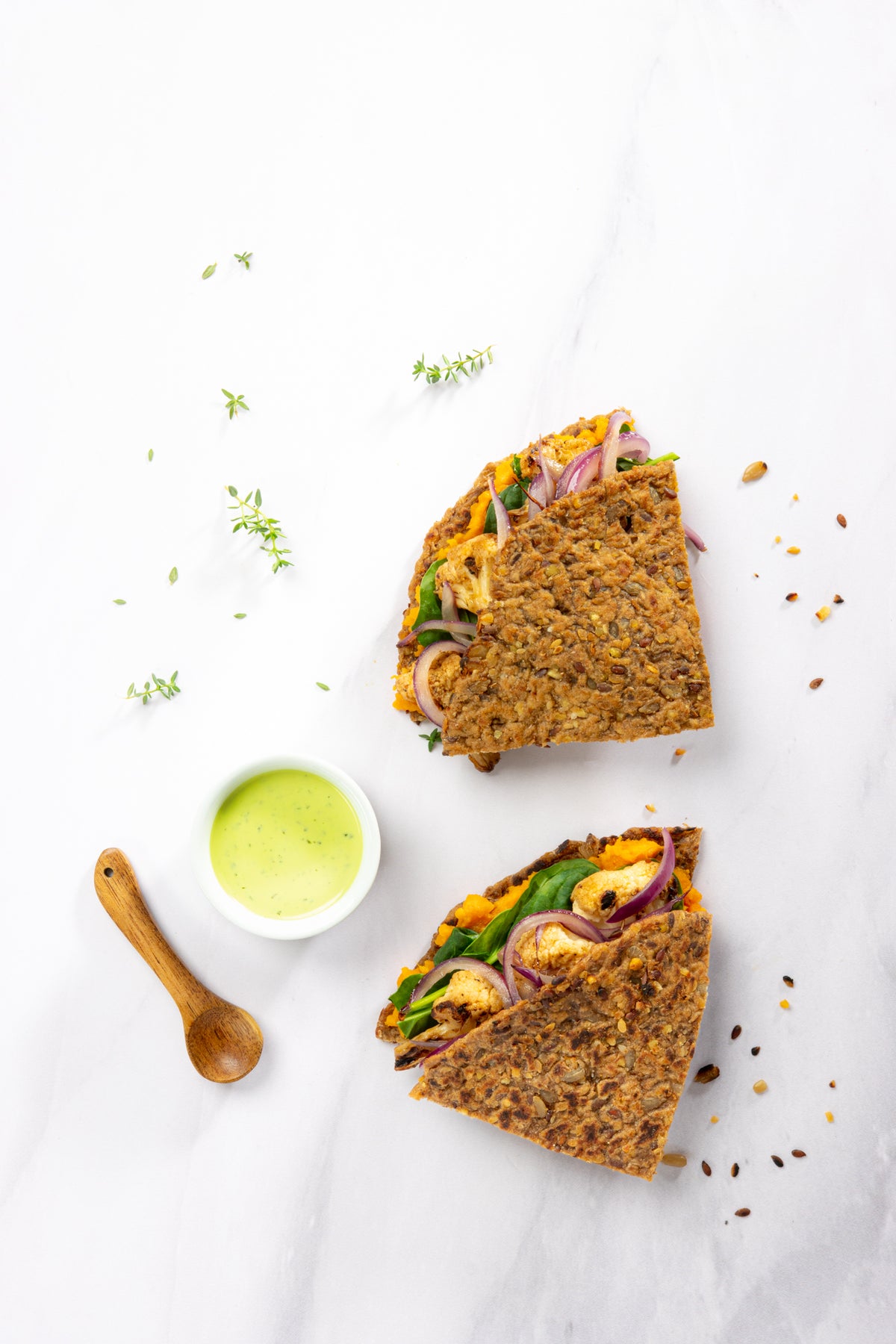 Primal Bakery protein Wrap filled with vegetables and grilled chicken